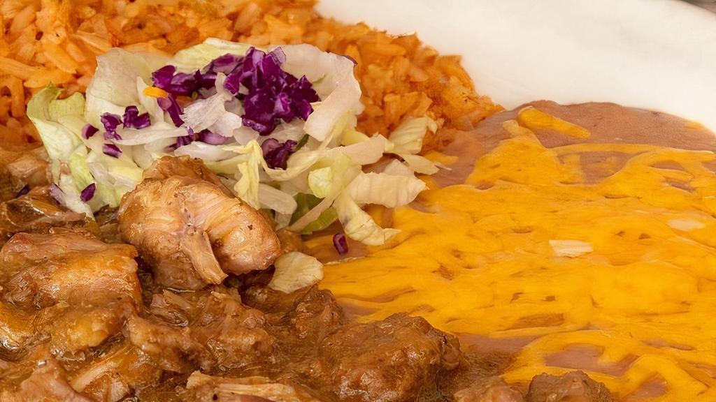 Combo #12 · Green chile plate.  Served with rice & beans.