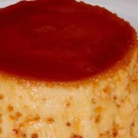 Flan · Mexican custard topped with caramel sauce and whipped cream.
