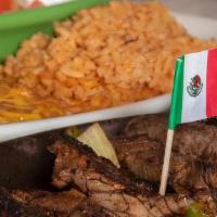 Sizzling Fajitas · Grilled marinated meat of your choice served with beans, rice, guacamole, salsa fresca and a...
