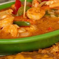 Camarones Rancheros · Sauteed shrimp tossed with ranchera sauce, bell peppers, onions and served with rice, beans ...