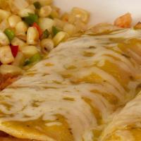 Vallarta Enchiladas · Two corn tortillas packed with fish, shrimp and our blend of cheeses.  Topped with green sau...