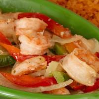 Camarones Al Mojo De Ajo · Sauteed shrimp tossed in garlic butter, bell peppers and onions and served with rice, beans ...