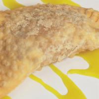 Empanada · Deep fried turnover filled with chicken and raisin.