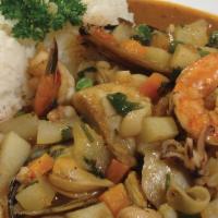 Cau Cau De Mariscos · It is a traditonal Peruvian stew, it is also made with seafood and served with rice.