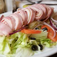 Antipasto Salad · Lettuce, tomatoes, olives, red onions, ham, salami, provolone cheese, prosciutto, roasted pe...
