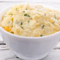 Potato Salad · Hearty potatoes tossed in a mildly spiced mayo mixture.