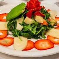 Salad Brazilian Berry · Strawberry, avocado, hearts of palm, spring mix, champagne vinaigrette