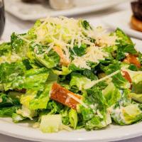 Salad Caesar · Romaine, Parmesan, homemade Caesar dressing and croutons.