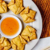 Crab Puffs (8) · Individually hand wrapped, filled with seasoned cream cheese and crab meat