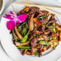 Mongolian Steak · Tender sliced steak wok fried with scallions and white onions with Chef's special soy sauce