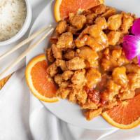 Spicy Orange Chicken · White meat chicken chunk battered and fried, then drizzled over with our chef’s spicy orange...