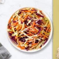 Coleslaw Slayer · Shredded cabbage and carrots dressed in mayonnaise and apple cider vinegar.