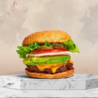 Avo Baby Burger (Vegan) · Plant-based patty topped with avocado, melted vegan cheese, lettuce, tomato, onion, and pick...