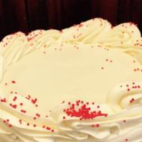 Whole Red Velvet Cake · Red velvet cake, chocolate truffle center, cream cheese frosting, red velvet crumbs.