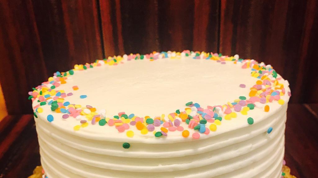 Whole Confetti Birthday Cake · Light sponge cake dotted with colored sprinkles, vanilla syrup, vanilla butter cream frosting, more sprinkles.