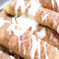 Extreme Cinnamon Breadsticks · Freshly baked and served with a side of vanilla icing. 190 calories per stick.