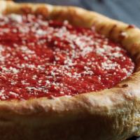 Italiano Deep Dish Pizza · 10 slices, up to two toppings, with a garlic buttery crust, and filled with layers of real W...