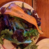 The Starter · A simple salad of seasonal greens, organic carrots and dried cranberries-dressed with raspbe...
