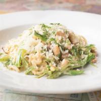 Sugar Snap Pea Carbonara · A traditional blending of fried house cured pancetta, chicken stock, egg and parmesan with s...