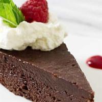 Torte, Torte, Torte! · OH, SO FUDGY flourless chocolate torte, topped with a spicy cinnamon whipped cream.