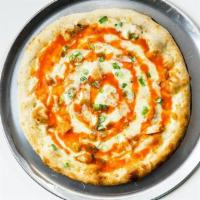 One-Way To Buffalo · Grilled chicken breast, scallions, house cheese blend, buffalo sauce