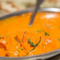 Chicken Tikka Masala · Chicken breast pieces marinated overnight in home made yogurt, spices, and herbs cooked with...