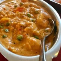 Vegetable Korma · Mixed vegetables & nuts cooked with butter sauce.(GF)(Vegan)