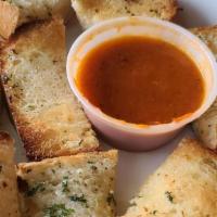 Garlic Bread · Italian bread rubbed with garlic butter and baked, served with side of house made marinara s...