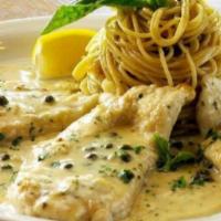 Chicken Piccata · Sautéed chicken breast in a lemon cream sauce with capers and artichoke hearts, served with ...