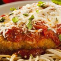 Chicken Parmesan · Chicken breast lightly breaded, topped with house made marinara sauce and mozzarella cheese,...