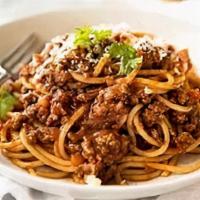 Spaghetti Bolognese · Spaghetti pasta sauteed in house made marinara meat sauce.