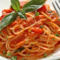Pasta Al Pomodoro · Spaghetti, penne, fettuccine or gluten free penne pasta, sauteed in our house made marinara ...