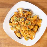 Fettuccine Frutti Di Mare · Fettuccine pasta with shrimp, calamari, mussels, clams, sauteed with garlic and house marina...