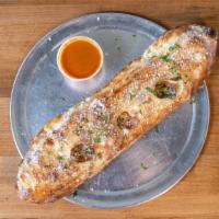 Calzone - Create Your Own · Fresh daily made dough stuffed with fresh mozzarella cheese. Hand stretched and made to orde...