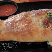 Porcellina Calzone (Meat Lovers) · Meat lovers. Mozzarella cheese, canadian bacon, pepperoni, house made sausage, meatball, sal...