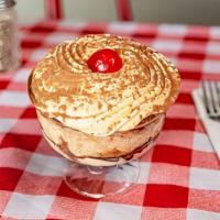 Coffee Tiramisu - House Made · House made with ladyfingers dipped in coffee, layered with a whipped mixture of eggs, sugar,...