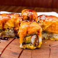 Volcano Roll · Crab meat, avocado inside, baked with spicy salmon and eel sauce