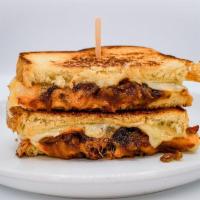 Ultimate Grilled Cheese · gruyere, cheddar, muenster, spanish onion, candied bacon, white bread