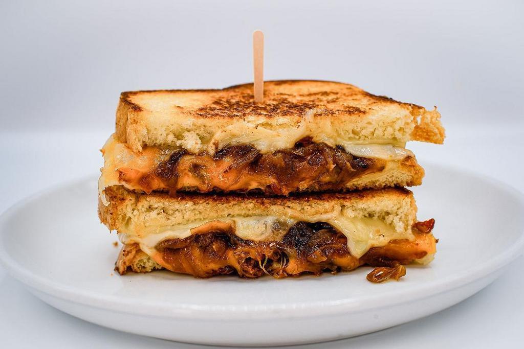 Ultimate Grilled Cheese · gruyere, cheddar, muenster, spanish onion, candied bacon, white bread