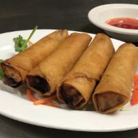 Egg Rolls (4 Pcs) · Deep fried homemade rolls wrapped with minced pork, clear noodles and vegetables. Served wit...