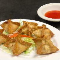 Crab Rangoon (6 Pcs) · Deep fried. Homemade with cream cheese and imitation crab filling. Served with Sweet Chili S...