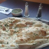 Garlic Naan · Leavened bread topped with garlic.