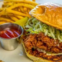Nashville Hot Fried Chicken Sandwich · House Spice Blend, Buttermilk Brined Chicken, Creamy Slaw & Pickles