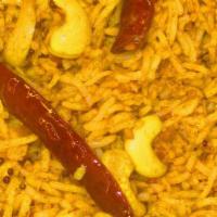 Tamarind Rice Tangy & Spicy (Vegan) · Spicy. 15 min. 20 ounces. Rice sauté with tamarind sauce and aromatic spices.