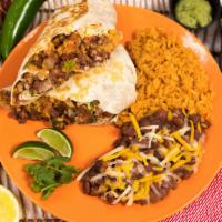 Loaded Chicken Burrito · Grilled chicken, rice, beans, pico de gallo & salsa served with Mexican rice & pinto beans.
