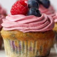 Berry Good Cupcake · Strawberry cake with buttercream frosting covered in crunchy strawberry crumble topping