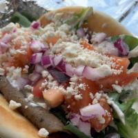 Gyros Sandwich · 1/4 lb beef, homemade taziki, lettuce, tomatoes, feta cheese and onions.