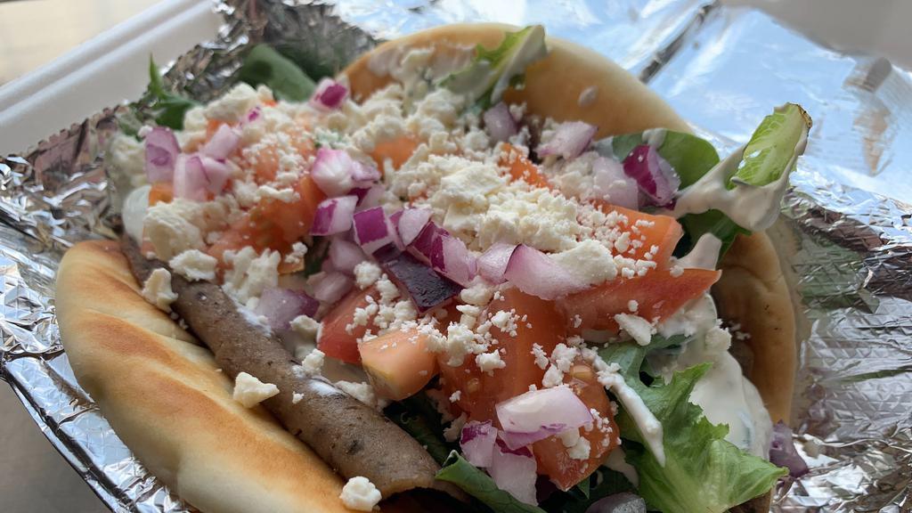 Gyros Sandwich · 1/4 lb beef, homemade taziki, lettuce, tomatoes, feta cheese and onions.