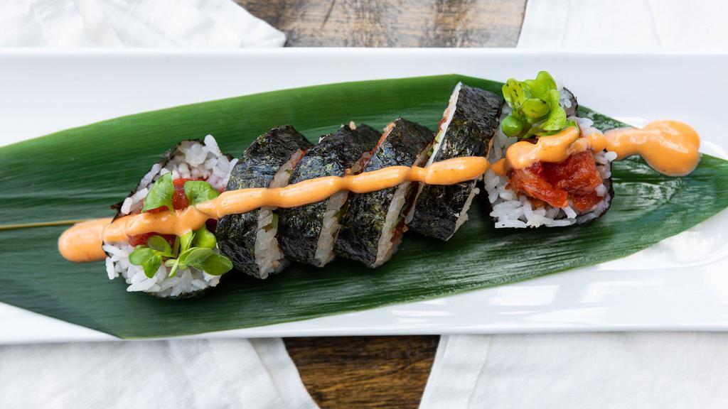 Spicy Tuna Roll · Spicy seasoned tuna, cucumber, topped with spicy mayo
