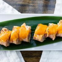 Salmon Torch Roll · Crab meat, cucumber and avocado topped with torched salmon and spicy mayo.

Consuming raw se...
